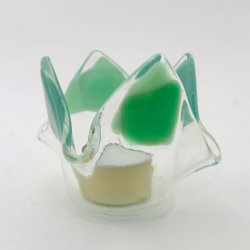 Fyrfadslysestage i blgrnne farver