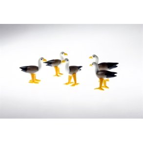 Mini havmge med gule gummistvler 